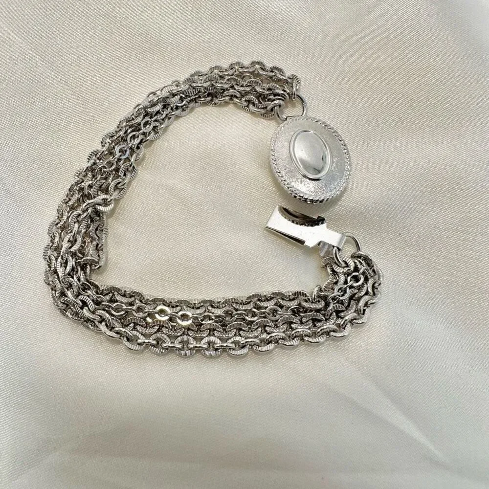 Avon silver tone multi chain bracelet
